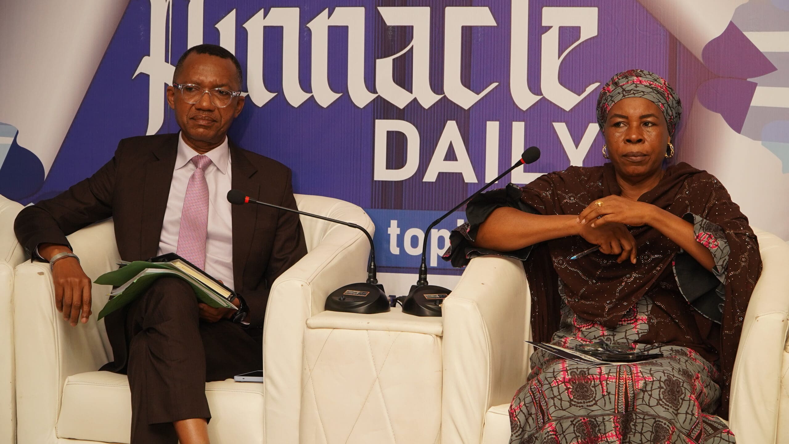 MR. AZU ISHIEKWENE LEFT AND MRS. ZAINAB OKINO DURING PANEL SESSION