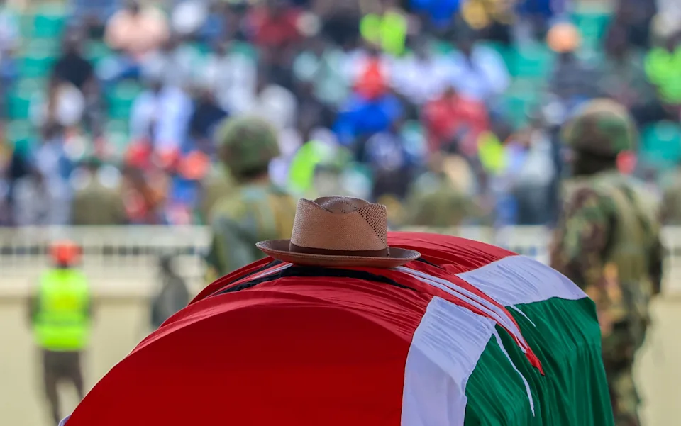 A cowboy hat that former Kenya Prime Minister Raila Odinga loved to wear lies on top of his coffin during his state funeral in Nairobi, Kenya, Friday, Oct. 17, 2025. Andrew Kasuku/Copyright 2025 The AP. All rights reserved.