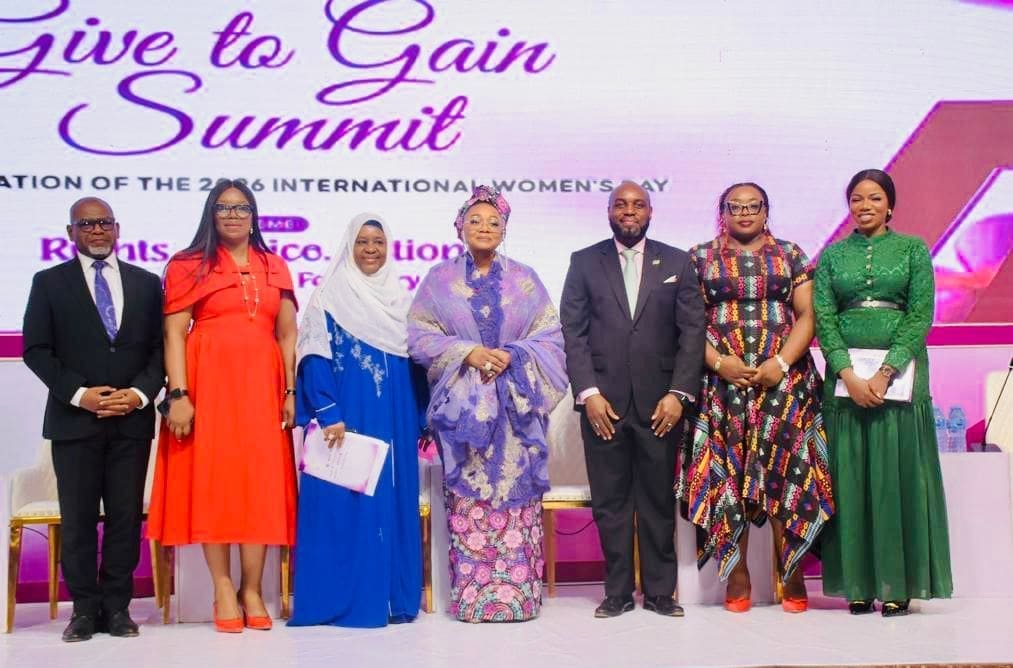 Left to Right Executive Commissioner Operations Securities and Exchange Commission Mr. Bola Ajomale, MD KudiMata Mrs. Kathleen Erhimu, Executive Commissioner Corporate Services SEC, Mrs. Samiya Usman, Minister of Women Affairs and Social Development, Hajiya Imaan Sulaiman-Ibrahim CEO NGX Regulation Limited Mr. Olufemi Shobanjo, Ag. mD Meristem Registrars Mrs. Nkechiyelu Okoye and CEO FinTribe Jennifer Awirigwe at the grand finale of the “Give to Gain” Summit to mark the 2026 International Women’s Month in Abuja, Monday