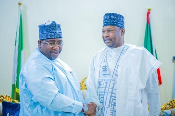 governor idris and Abubakar Malami SAN shaking hands